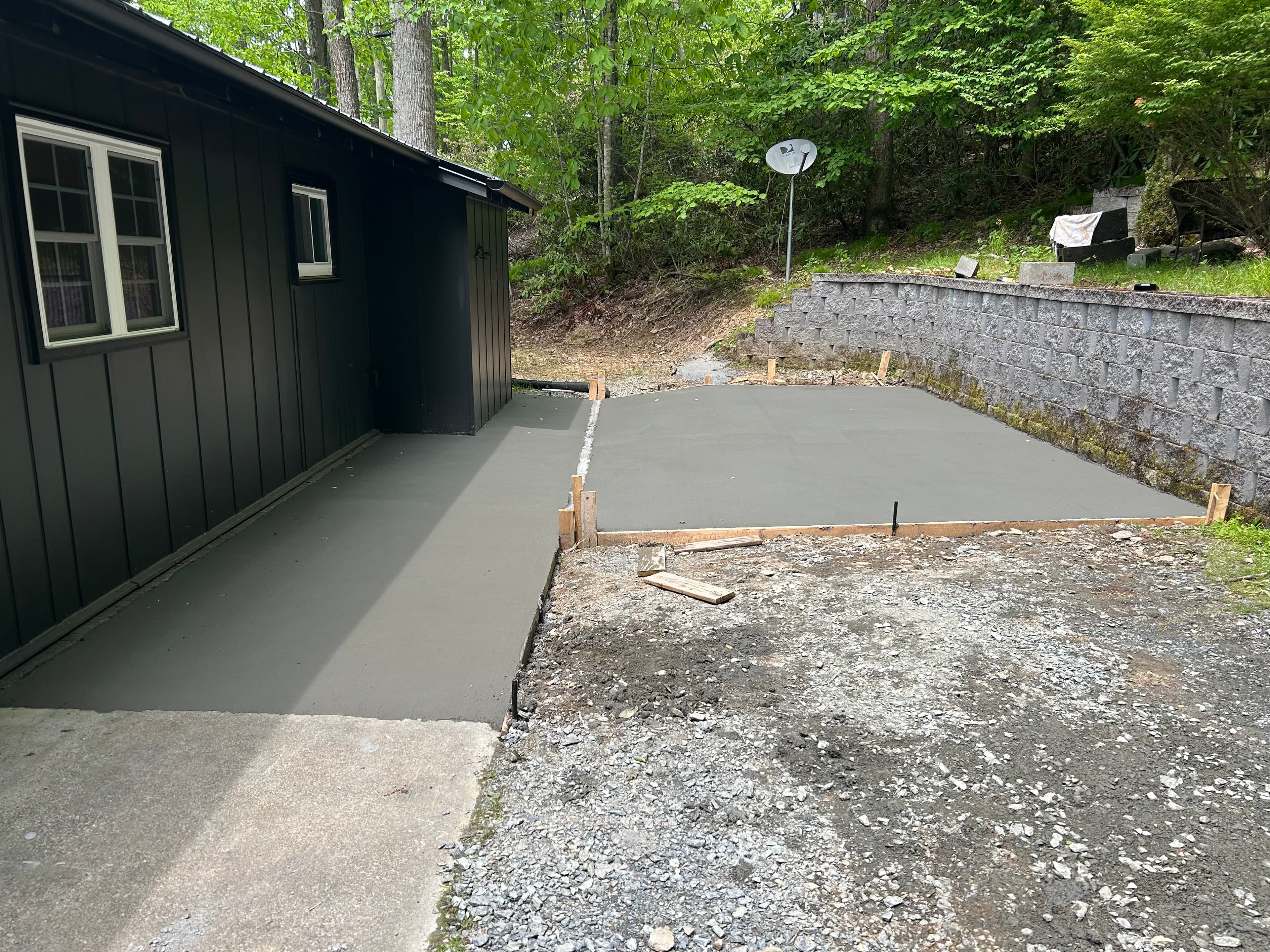 Finished patio and walkway beside a home